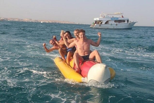 Kids enjoying the Floating Aqua Park at Hula Hula Island.