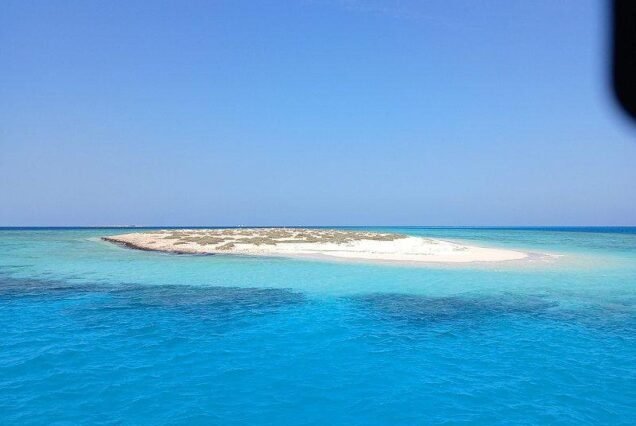 Pristine white sand beach at Hamata Islands in Marsa Alam Red Sea.