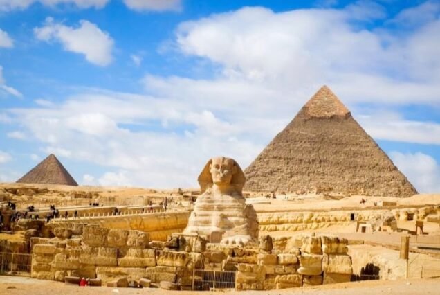 Giza Pyramids excursions: Standing before the Great Pyramid of Khufu